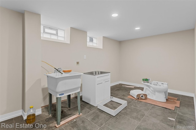 1746 N Lafayette St, Dearborn, MI 48128 - laundry room featuring baseboards and recessed lighting