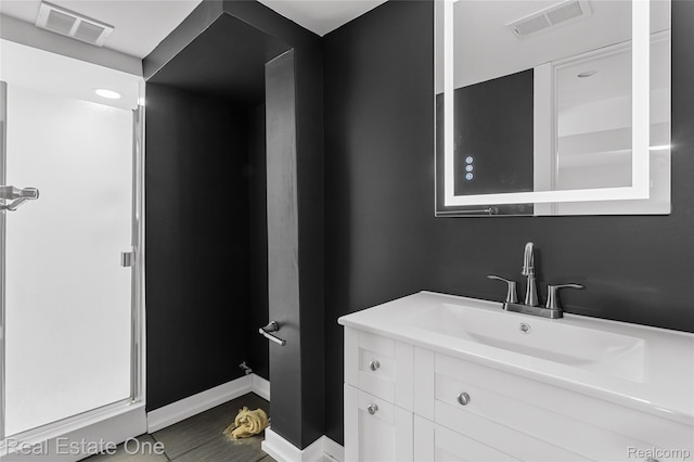 1746 N Lafayette St, Dearborn, MI 48128 - bathroom featuring vanity and wood finished floors