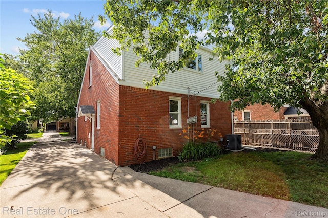 1746 N Lafayette St, Dearborn, MI 48128 - view of home's exterior with brick siding and concrete driveway