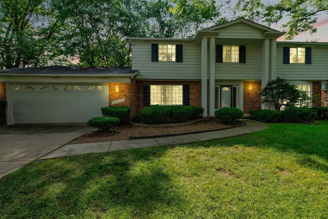 29947 Fernhill Dr, Farmington, MI 48331 - neoclassical home featuring brick siding, concrete driveway, a garage, and a front lawn