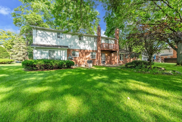 29947 Fernhill Dr, Farmington, MI 48331 - rear view of property featuring a yard, a chimney, and brick siding