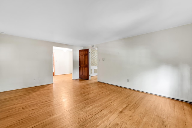 29947 Fernhill Dr, Farmington, MI 48331 - spare room featuring light wood finished floors and baseboards