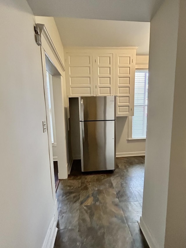 5208 Commonwealth St, Detroit, MI 48208 - kitchen featuring freestanding refrigerator and concrete flooring