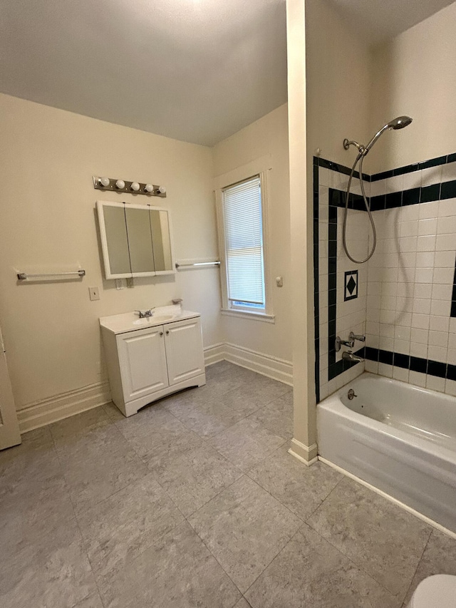5208 Commonwealth St, Detroit, MI 48208 - bathroom featuring bathtub / shower combination, vanity, and tile patterned floors