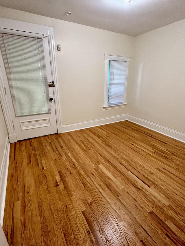 5208 Commonwealth St, Detroit, MI 48208 - unfurnished room with light wood finished floors and baseboards