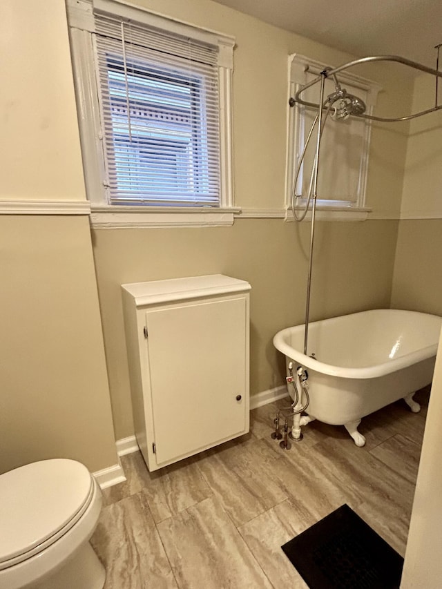 5208 Commonwealth St, Detroit, MI 48208 - full bathroom with a freestanding tub and a shower