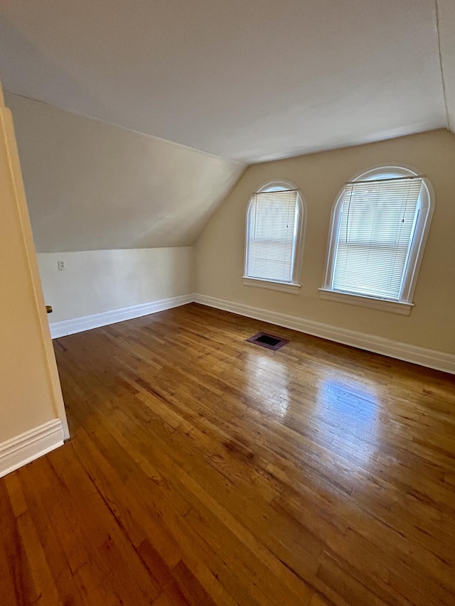 5208 Commonwealth St, Detroit, MI 48208 - additional living space with lofted ceiling and wood finished floors