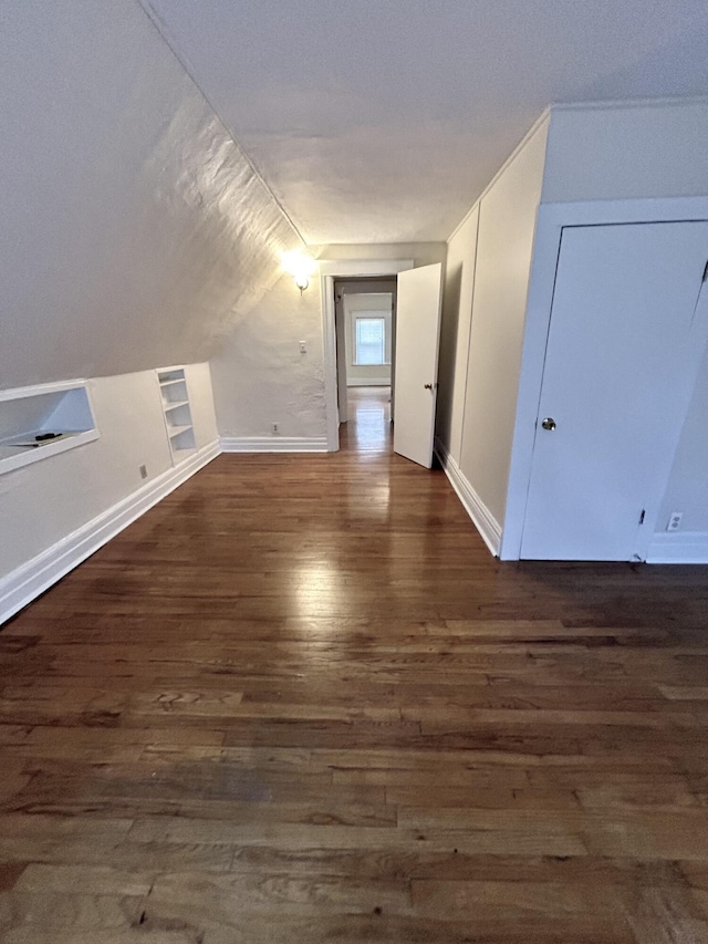 5208 Commonwealth St, Detroit, MI 48208 - additional living space with wood finished floors, built in shelves, and vaulted ceiling