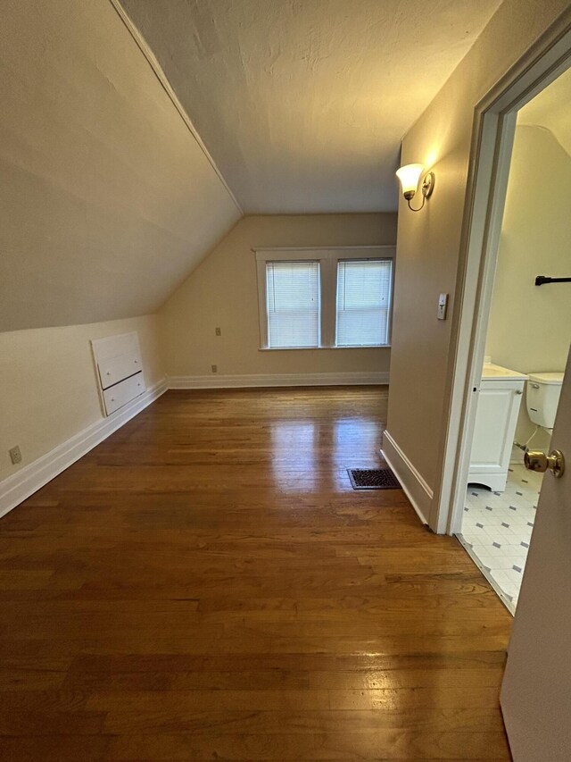 5208 Commonwealth St, Detroit, MI 48208 - additional living space with wood finished floors and lofted ceiling