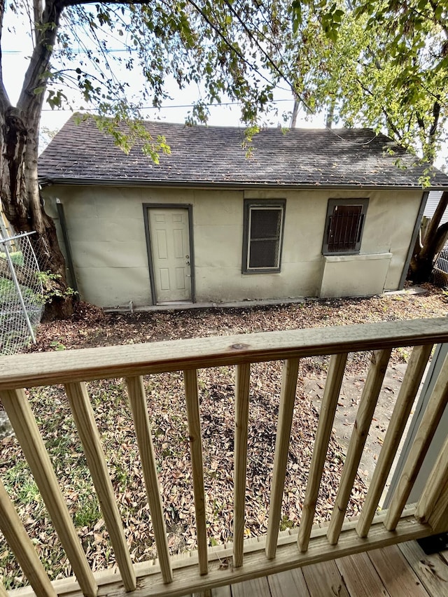 5208 Commonwealth St, Detroit, MI 48208 - rear view of house with roof with shingles and a deck