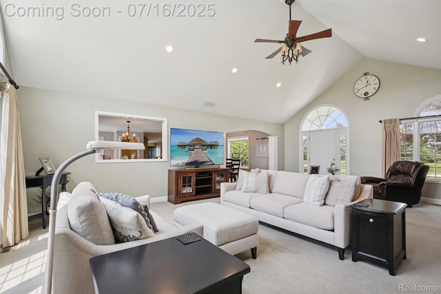 378 Fruitdale Ln, Pinckney, MI 48169 - living room featuring high vaulted ceiling, carpet flooring, ceiling fan, recessed lighting, and arched walkways