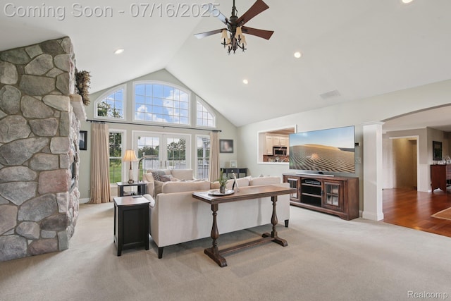 378 Fruitdale Ln, Pinckney, MI 48169 - living room featuring light colored carpet, a ceiling fan, high vaulted ceiling, recessed lighting, and ornate columns