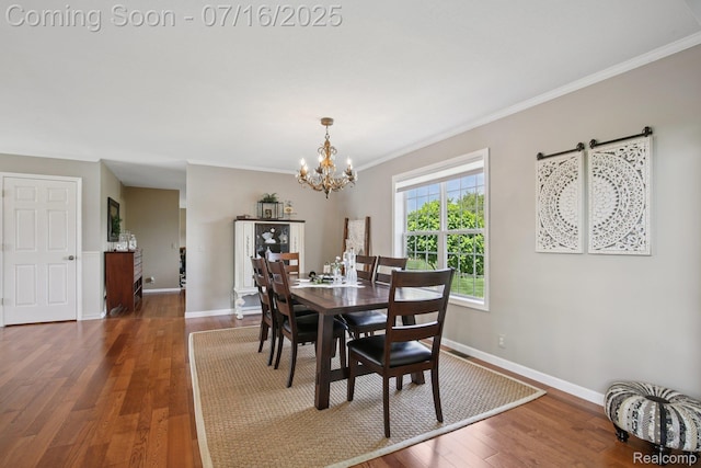 378 Fruitdale Ln, Pinckney, MI 48169 - dining space with a chandelier, wood finished floors, and crown molding