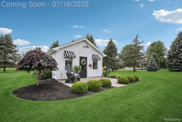 378 Fruitdale Ln, Pinckney, MI 48169 - view of home's exterior with a lawn and a patio