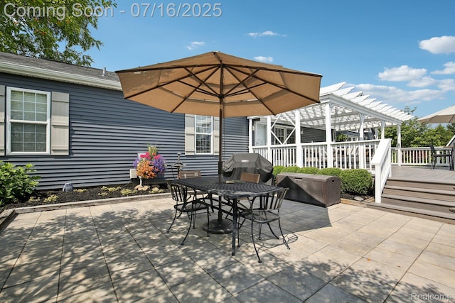 378 Fruitdale Ln, Pinckney, MI 48169 - view of patio / terrace with a pergola, a wooden deck, area for grilling, and outdoor dining area