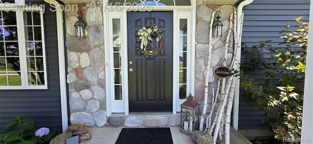 378 Fruitdale Ln, Pinckney, MI 48169 - doorway to property with stone siding