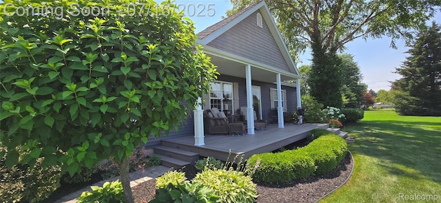 378 Fruitdale Ln, Pinckney, MI 48169 - view of property exterior with a lawn and a wooden deck