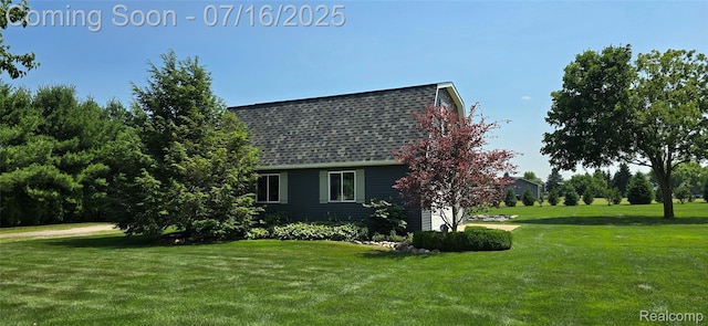 378 Fruitdale Ln, Pinckney, MI 48169 - view of property exterior featuring a lawn and roof with shingles