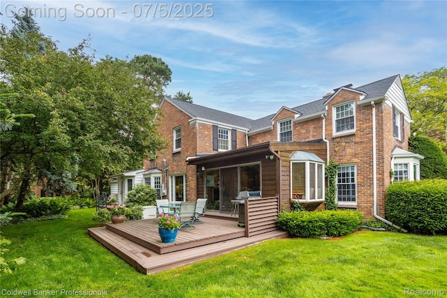 17 Colonial Rd, Grosse Pointe Shores, MI 48236 - rear view of house with brick siding, a deck, and a lawn