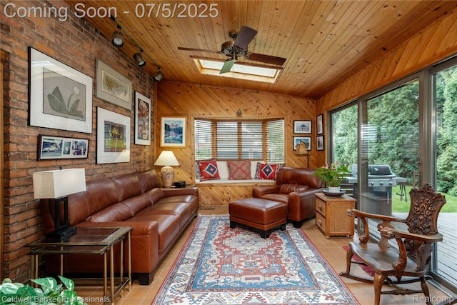 17 Colonial Rd, Grosse Pointe Shores, MI 48236 - living area with a skylight, wooden ceiling, light tile patterned floors, wood walls, and ceiling fan