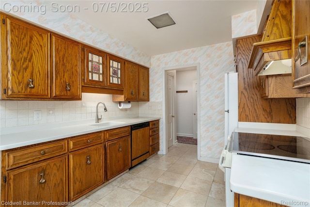 17 Colonial Rd, Grosse Pointe Shores, MI 48236 - kitchen featuring paneled dishwasher, wallpapered walls, brown cabinetry, and light countertops