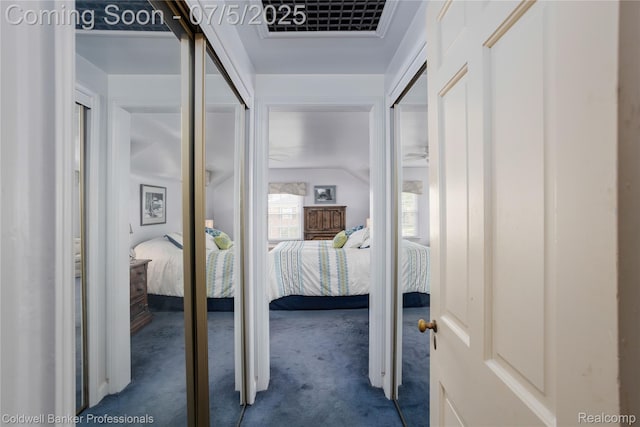 17 Colonial Rd, Grosse Pointe Shores, MI 48236 - hallway with dark carpet and vaulted ceiling