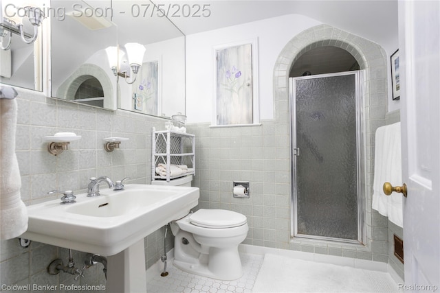 17 Colonial Rd, Grosse Pointe Shores, MI 48236 - full bathroom with tile walls, a shower stall, and tile patterned floors