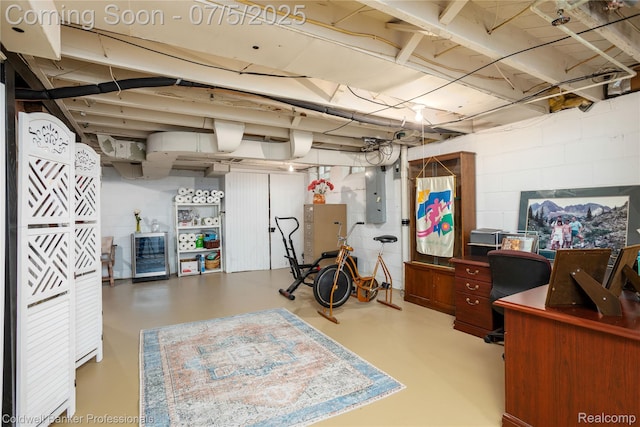 17 Colonial Rd, Grosse Pointe Shores, MI 48236 - unfinished basement featuring electric panel, beverage cooler, a desk, and concrete block wall