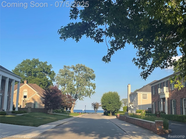 17 Colonial Rd, Grosse Pointe Shores, MI 48236 - view of asphalt road featuring a residential view