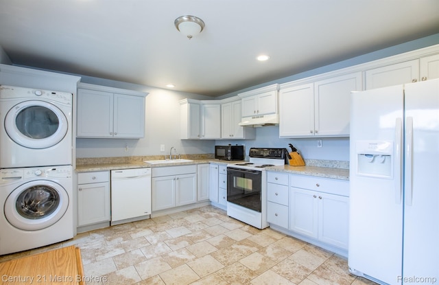 2512 Flintridge St, Lake Orion, MI 48359 - kitchen featuring white appliances, stacked washer / drying machine, under cabinet range hood, light countertops, and recessed lighting