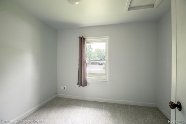 2512 Flintridge St, Lake Orion, MI 48359 - carpeted empty room featuring attic access and baseboards