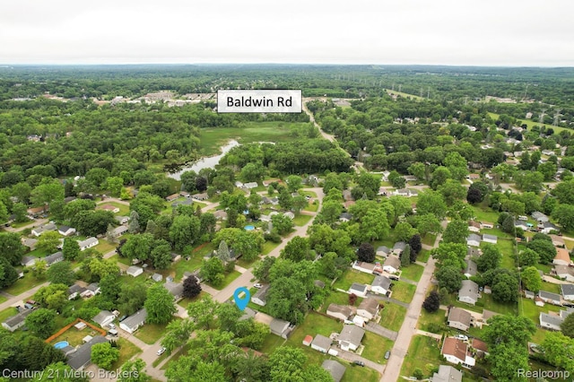 2512 Flintridge St, Lake Orion, MI 48359 - aerial perspective of suburban area featuring a heavily wooded area