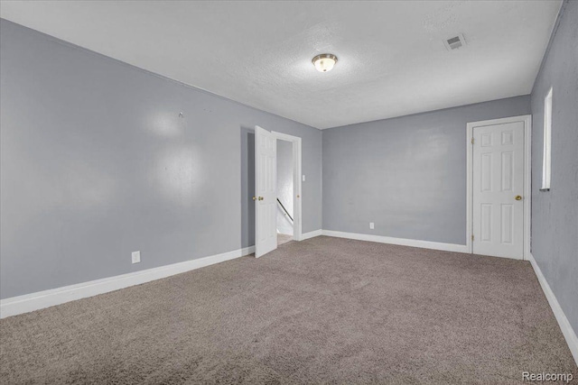 18040 Indiana St, Detroit, MI 48221 - unfurnished room with a textured ceiling and carpet