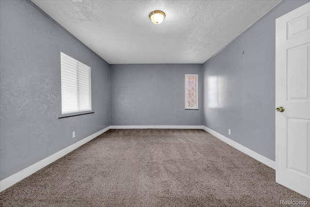 18040 Indiana St, Detroit, MI 48221 - empty room with carpet and a textured ceiling