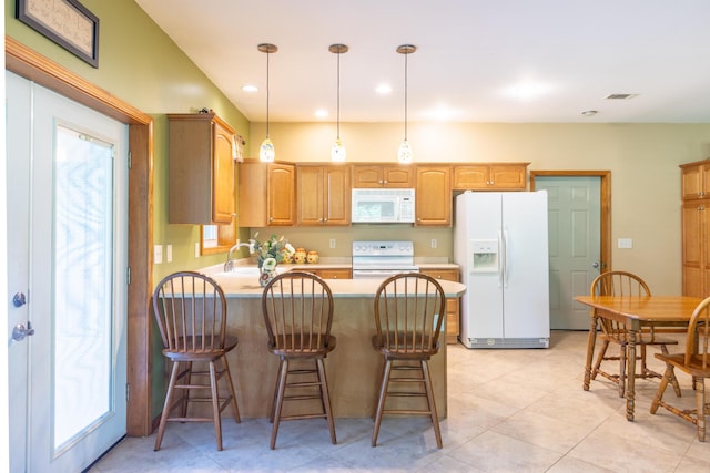 56234 Sink Rd, Dowagiac, MI 49047 - kitchen with white appliances, plenty of natural light, a peninsula, light countertops, and recessed lighting