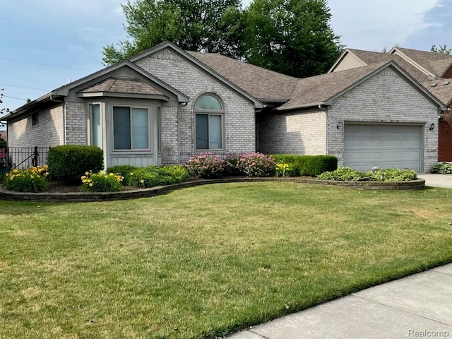 23287 Angel Park Dr, Macomb, MI 48042 - ranch-style house featuring brick siding, a garage, a shingled roof, and driveway