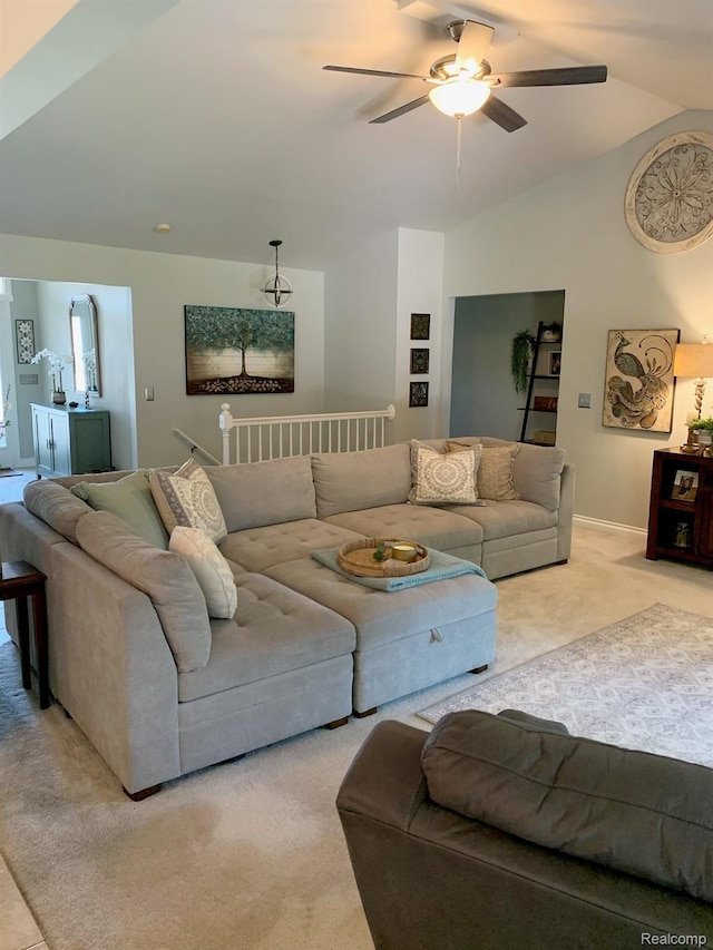 23287 Angel Park Dr, Macomb, MI 48042 - carpeted living room featuring a ceiling fan and vaulted ceiling