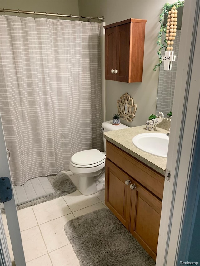 23287 Angel Park Dr, Macomb, MI 48042 - full bathroom with vanity, tile patterned flooring, and a shower with curtain