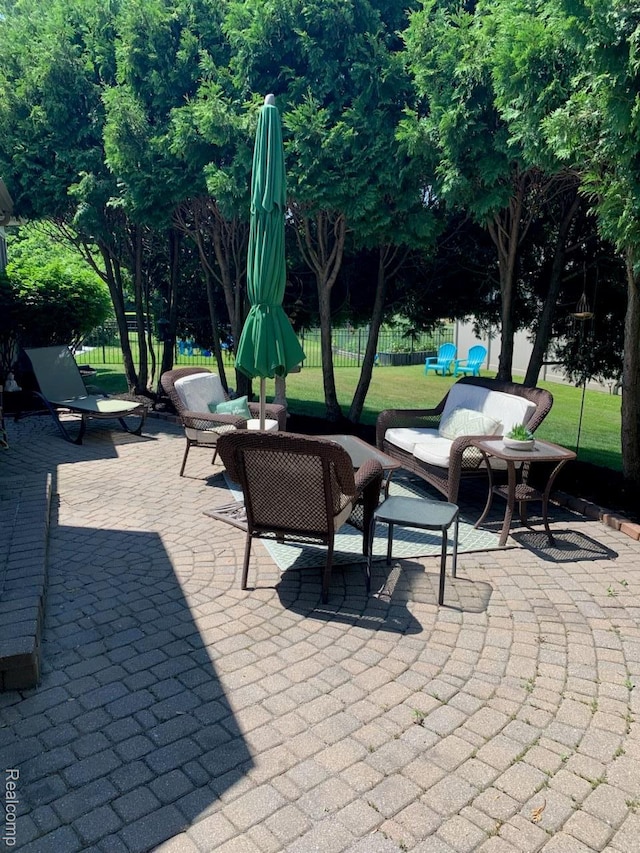 23287 Angel Park Dr, Macomb, MI 48042 - view of patio / terrace featuring an outdoor hangout area