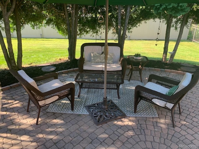 23287 Angel Park Dr, Macomb, MI 48042 - fenced backyard with a patio