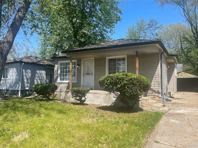 7800 Rutland St, Detroit, MI 48228 - bungalow-style home with a front lawn and covered porch