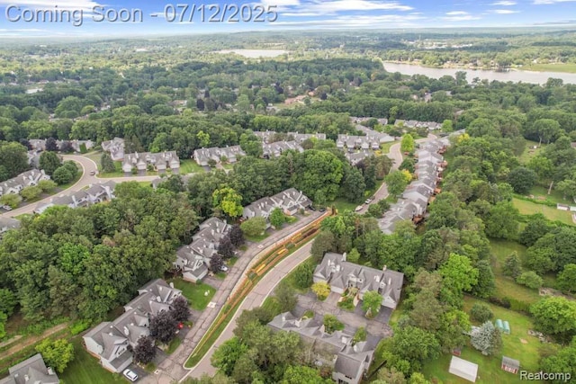 6559 Ridgeview Dr, Clarkston, MI 48346 - aerial view of residential area featuring a large body of water
