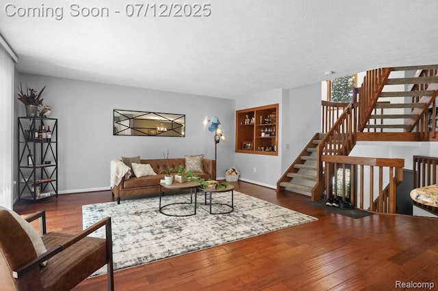 6559 Ridgeview Dr, Clarkston, MI 48346 - living area featuring wood finished floors and stairs