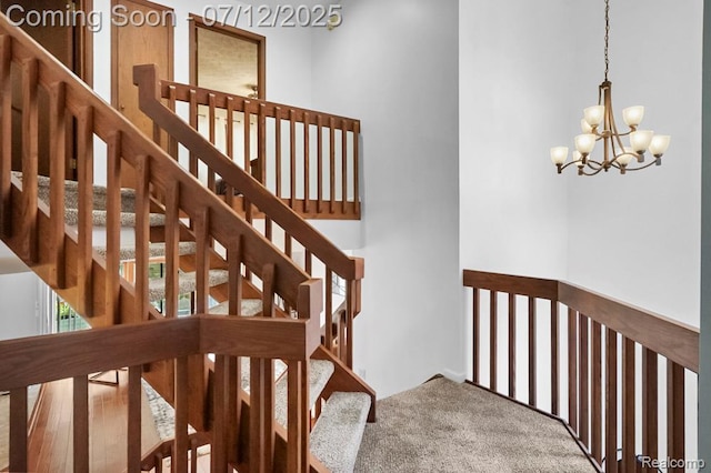 6559 Ridgeview Dr, Clarkston, MI 48346 - stairs with a chandelier and carpet flooring