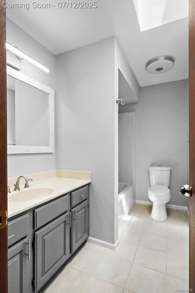 6559 Ridgeview Dr, Clarkston, MI 48346 - full bathroom featuring vanity, tile patterned flooring, and a skylight