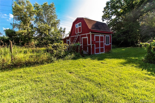 2380 Wilder Rd, Metamora, MI 48455 - view of green lawn with a barn and an outdoor structure