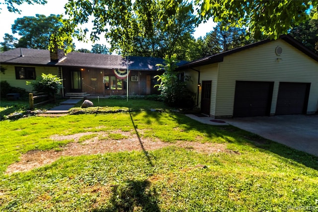 2380 Wilder Rd, Metamora, MI 48455 - ranch-style house with a garage, concrete driveway, and a front lawn