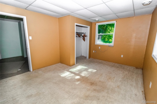 2380 Wilder Rd, Metamora, MI 48455 - unfurnished bedroom with a drop ceiling, carpet floors, and a closet