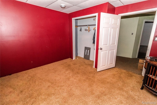 2380 Wilder Rd, Metamora, MI 48455 - unfurnished bedroom with a drop ceiling, carpet flooring, and a closet