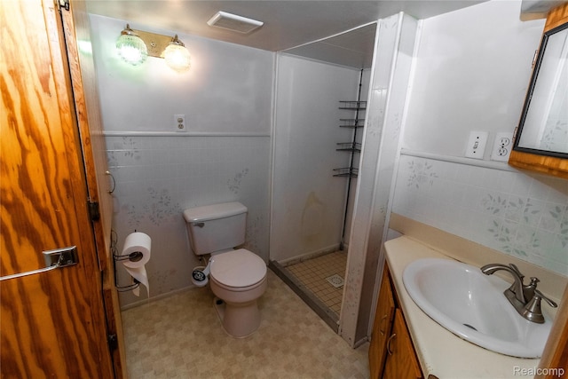 2380 Wilder Rd, Metamora, MI 48455 - full bath with tile walls, vanity, a shower stall, tile patterned floors, and wainscoting